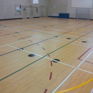 Synthetic gymnasium flooring