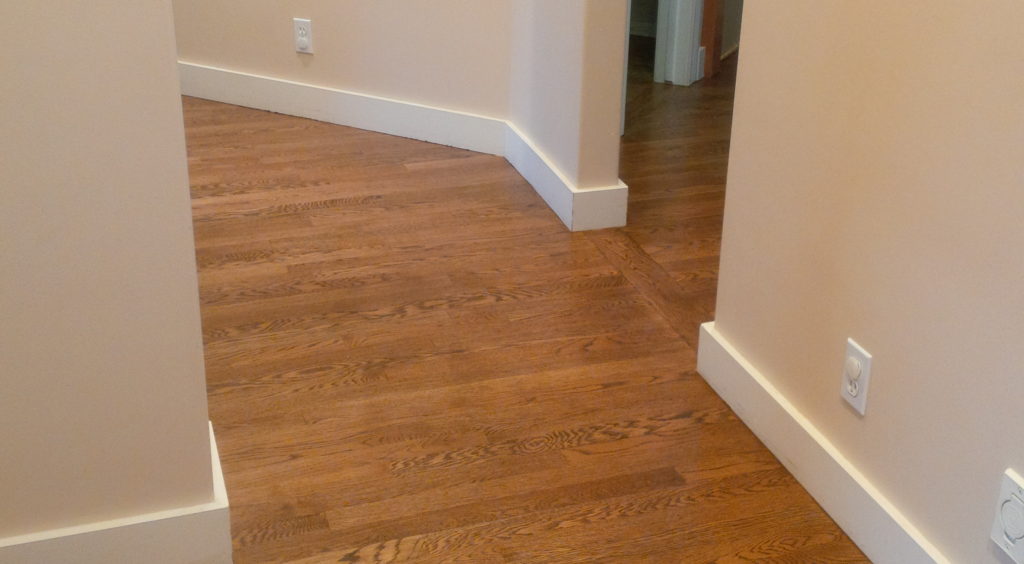 hardwood floor residential hallway